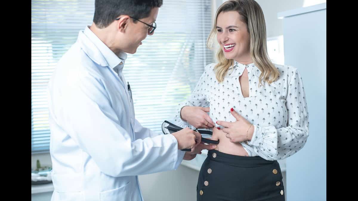Women consulting doctor about Belly fat